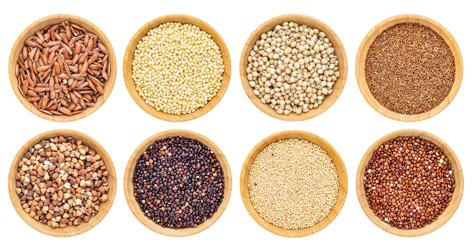Eight wooden bowls holding rice, millet, buckwheat, quinoa and other naturally gluten-free grains